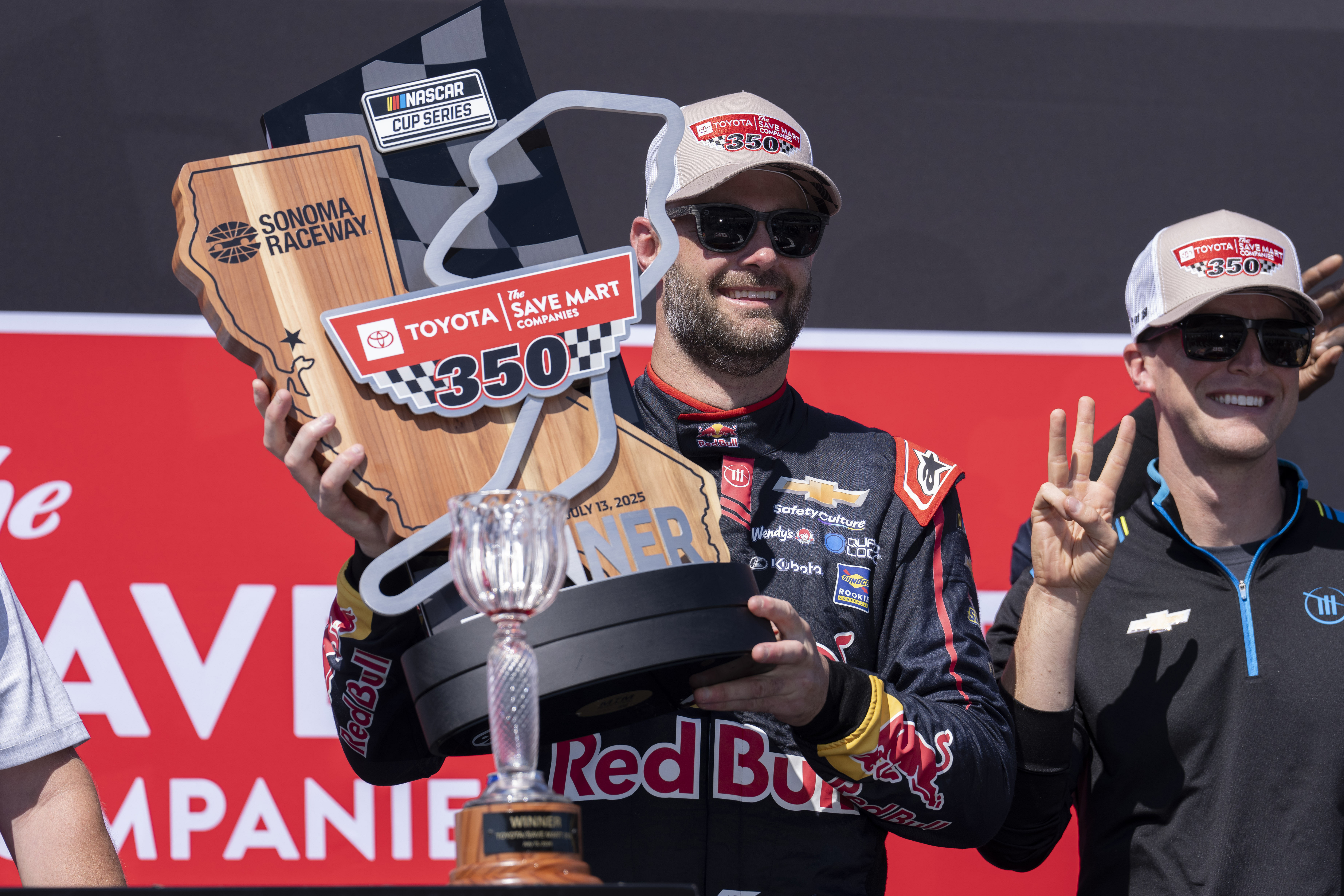 NASCAR Cup Series driver Shane van Gisbergen with the NASCAR Toyota/Save Mart 350 trophy. Source: Imagn